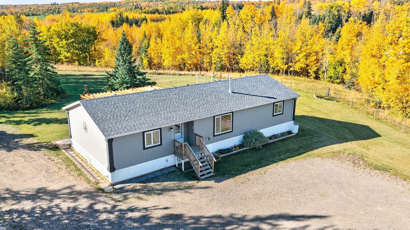 Aerial and exterior photograph of a residential property 1