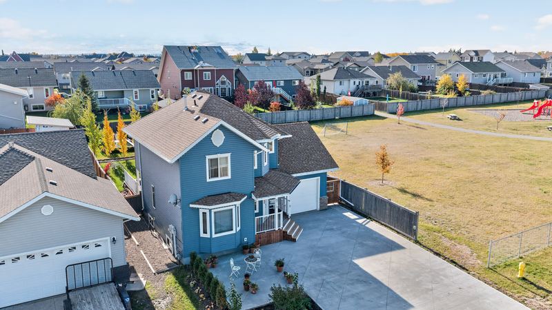 Aerial and exterior photograph of a residential property 2