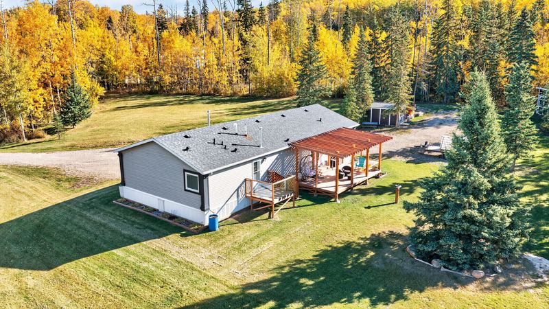 Aerial and exterior photograph of a residential property 4