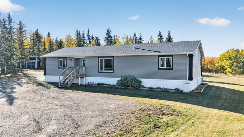 Aerial and exterior photograph of a residential property 9