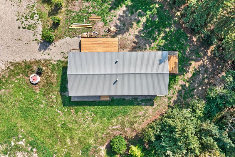 Aerial and exterior photograph of a residential property 12