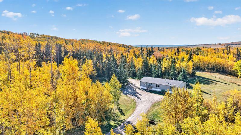 Aerial and exterior photograph of a residential property 15