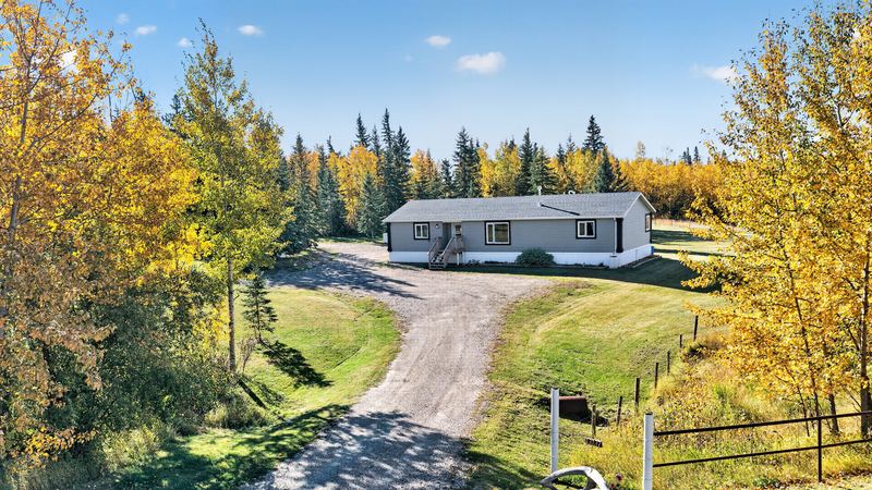 Aerial and exterior photograph of a residential property 16